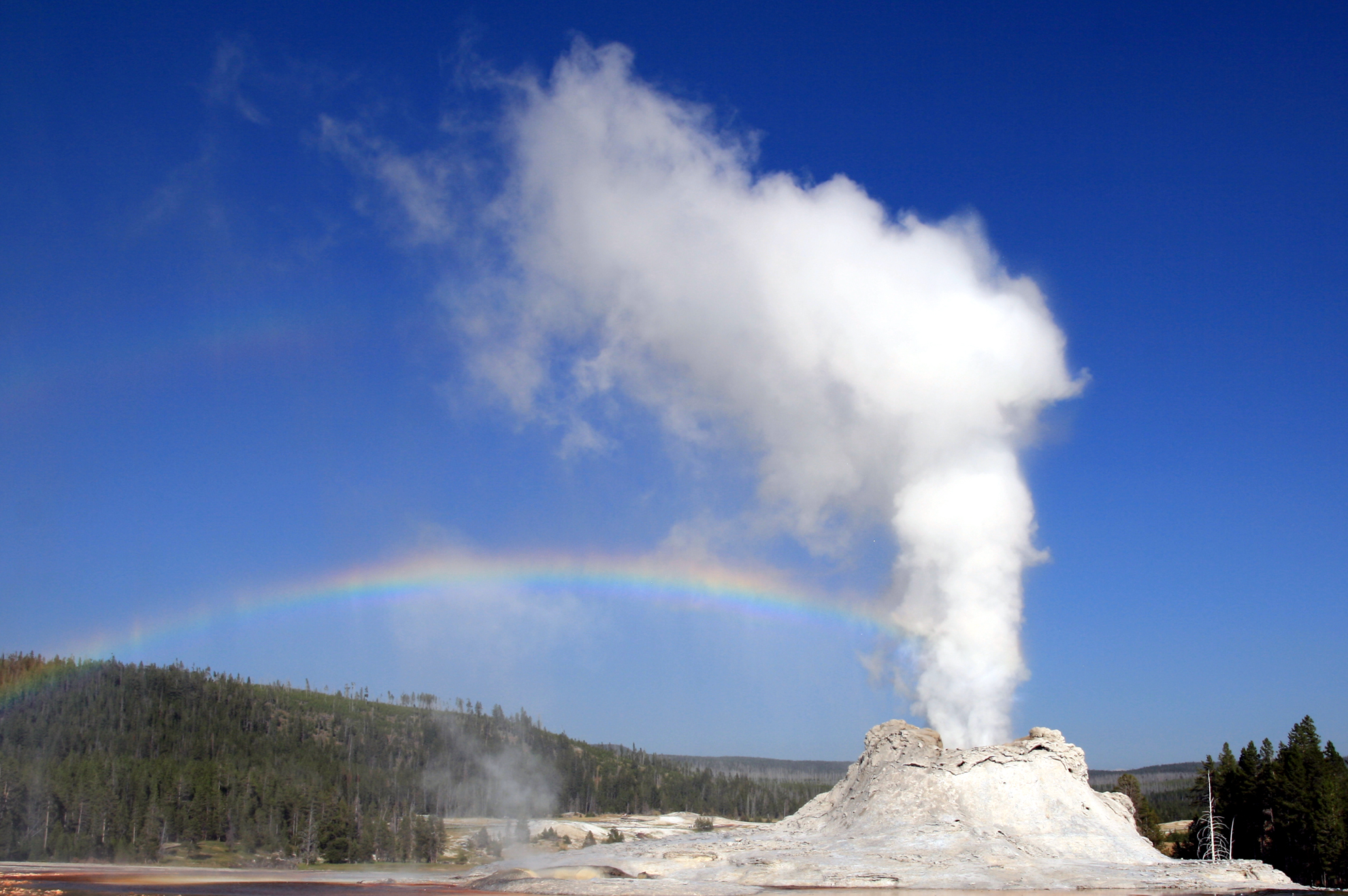 geyser with rainbow